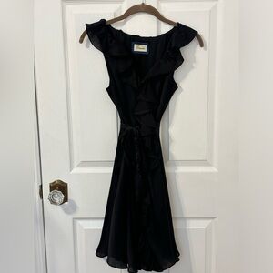 Black ruffle dress with satin fabric